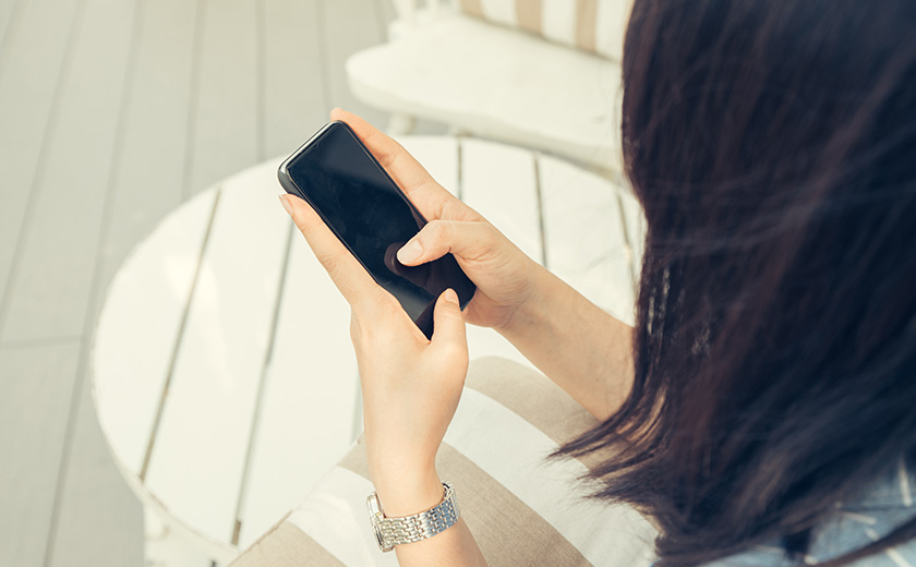 Girl holding a smartphone